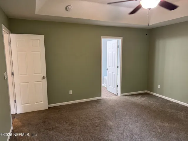 a view of outdoor space with garden and patio