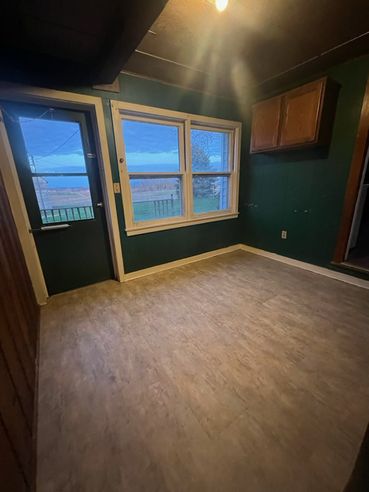 21743 Ideal Road Chadwick, IL 61014 - Photo 26 of 35 a view of an empty room with a window