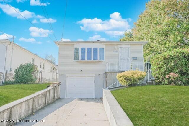122 Retford Avenue Staten Island, NY 10312 - Photo 1 of 29 a front view of a house with garden