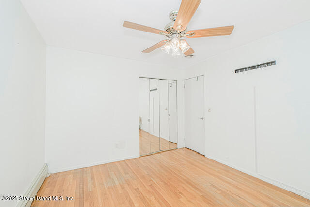 122 Retford Avenue Staten Island, NY 10312 - Photo 19 of 29 a view of a room with wooden floor