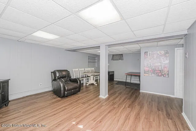 a room with furniture and wooden floor