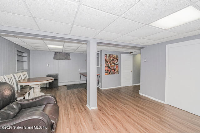 122 Retford Avenue Staten Island, NY 10312 - Photo 27 of 29 a living room with furniture and a wooden floor