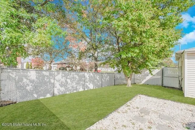 a view of a backyard with a garden