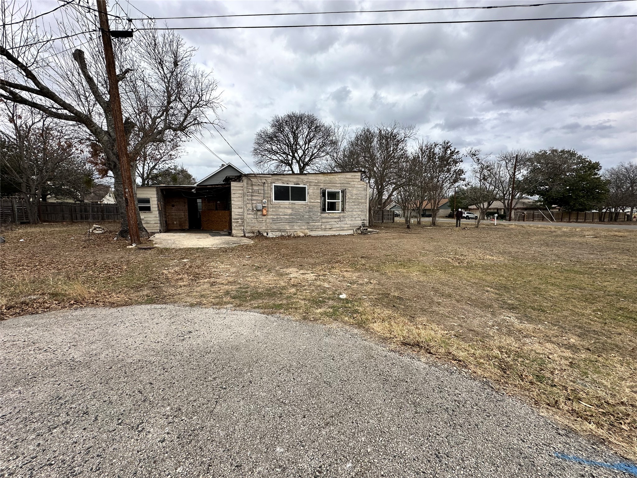 408 West Allen Street Kyle, TX 78640 - Photo 17 of 20 Bungalow featuring a patio and stone siding
