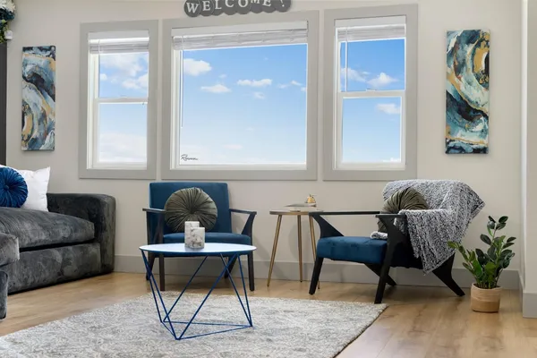 a bedroom with a bed and flat screen tv