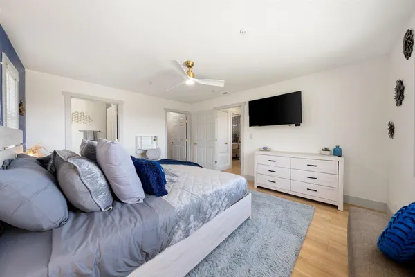 a view of a room with furniture and front door