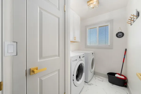 a bathroom with a sink toilet and mirror