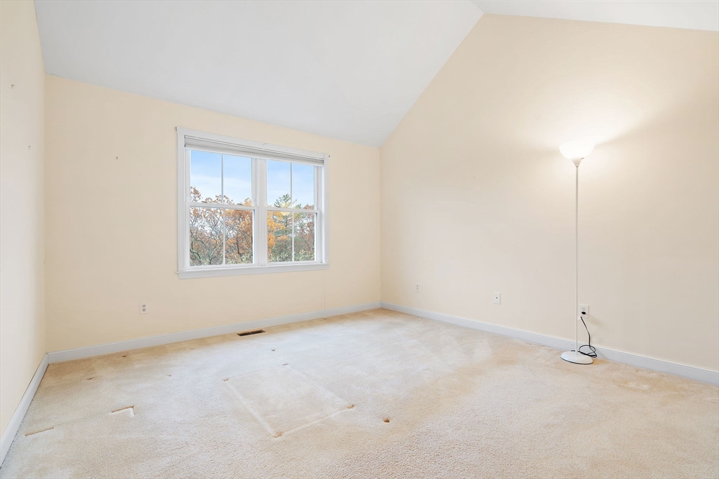 7 E Strawberry Lane, Unit E Hudson, MA 01749 - Photo 22 of 38 an empty room with windows