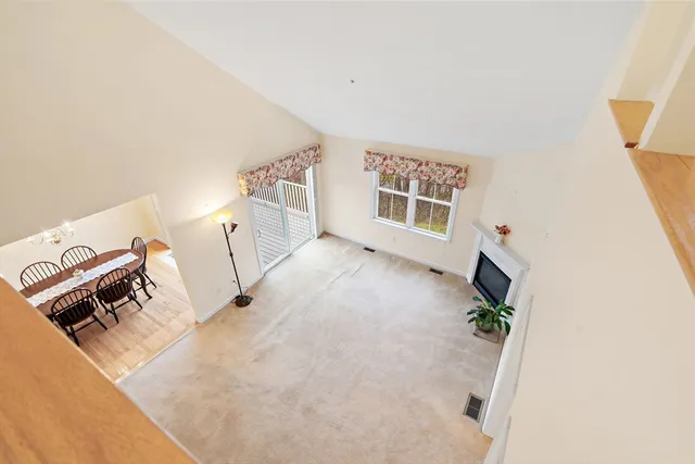 a view of balcony with wooden floor