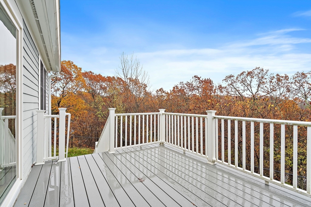 7 E Strawberry Lane, Unit E Hudson, MA 01749 - Photo 30 of 38 a view of balcony with wooden floor