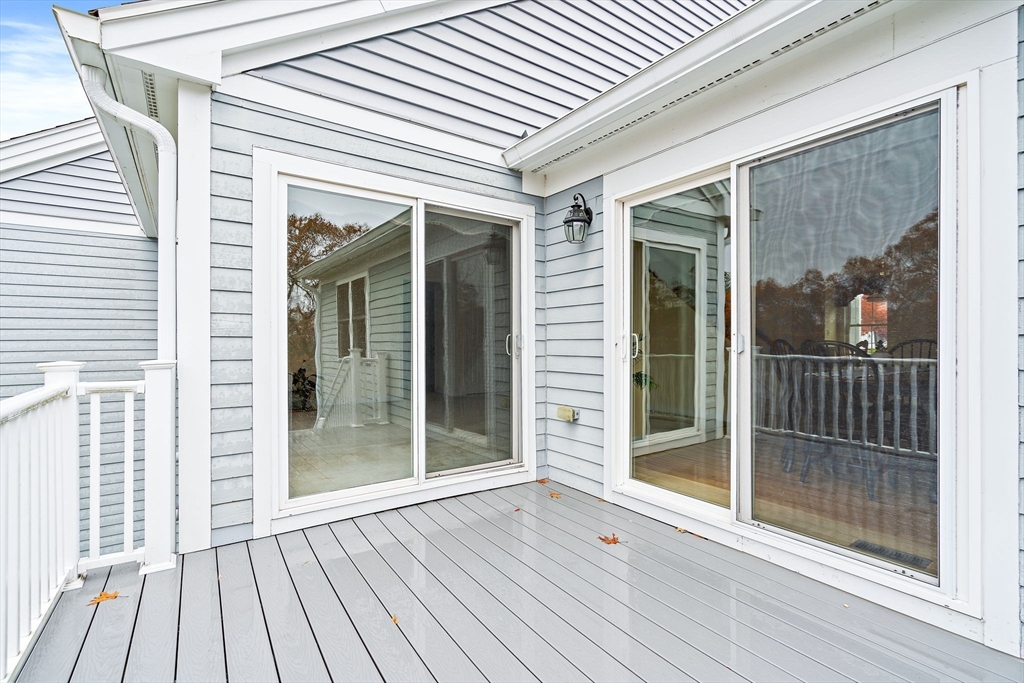 7 E Strawberry Lane, Unit E Hudson, MA 01749 - Photo 31 of 38 a view of a house with a porch
