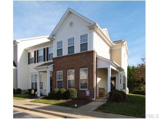 8220 City Loft Court Raleigh, NC 27613 - Photo 1 of 19 a front view of a house with a yard
