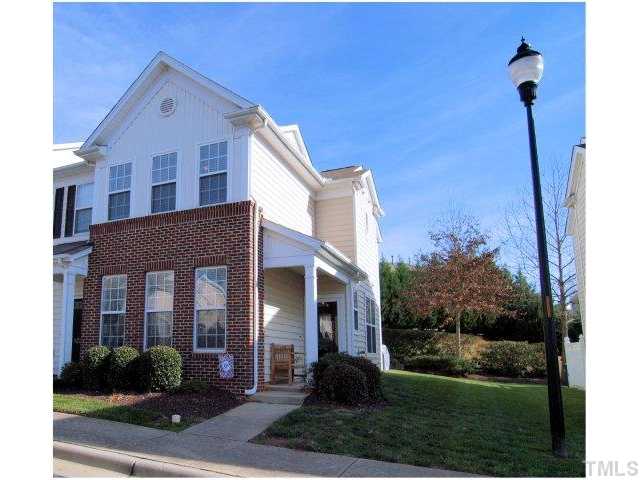 8220 City Loft Court Raleigh, NC 27613 - Photo 2 of 19 a front view of a house with garden