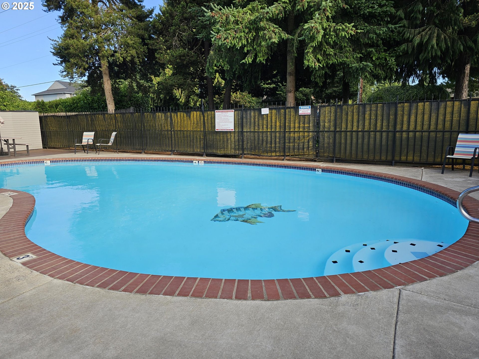 773 Boone Road Southeast, Unit 20 Salem, OR 97302 - Photo 19 of 20 a view of a swimming pool and outdoor space