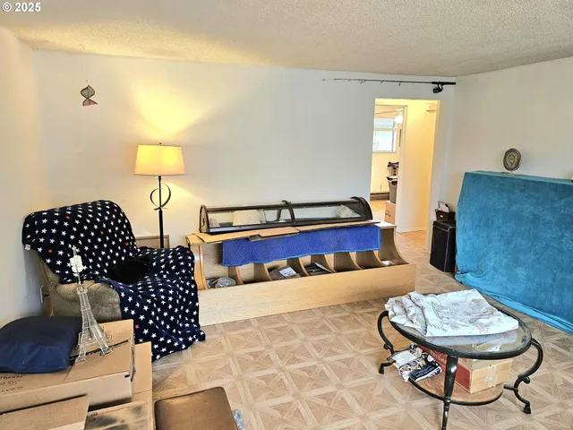 a living room with a couch and a table