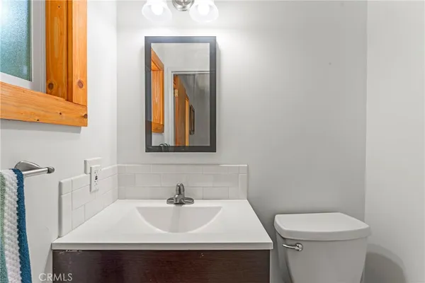 a bathroom with a sink and a toilet
