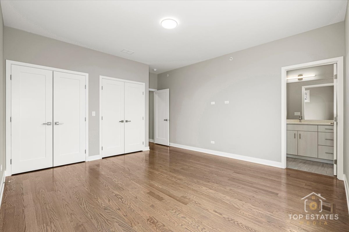 3638 South Western Avenue, Unit F Chicago, IL 60632 - Photo 23 of 36 a view of an empty room with wooden floor