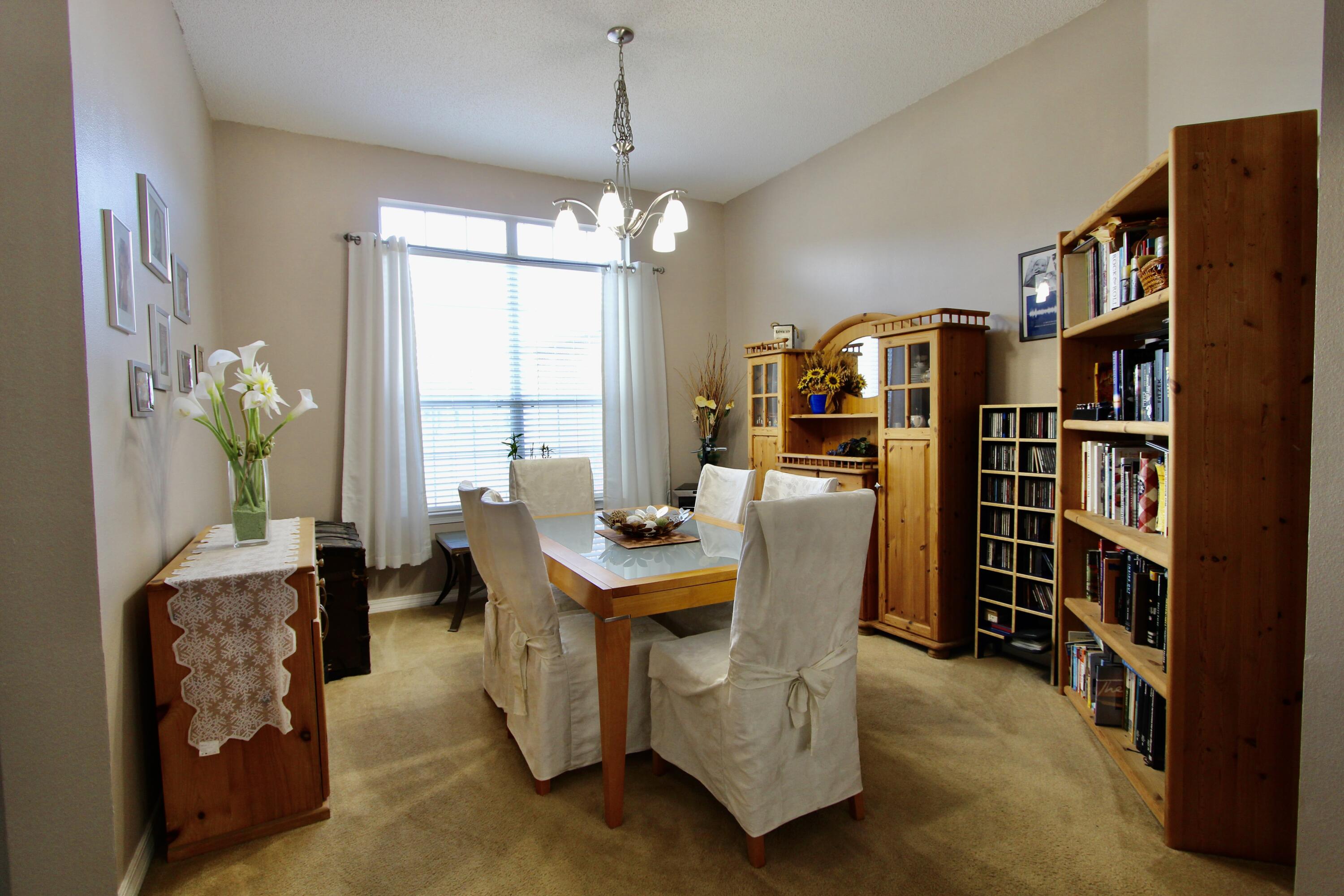 7183 Riverview Road Navarre, FL 32566 - Photo 14 of 39 a view of a livingroom with furniture window and wooden floor