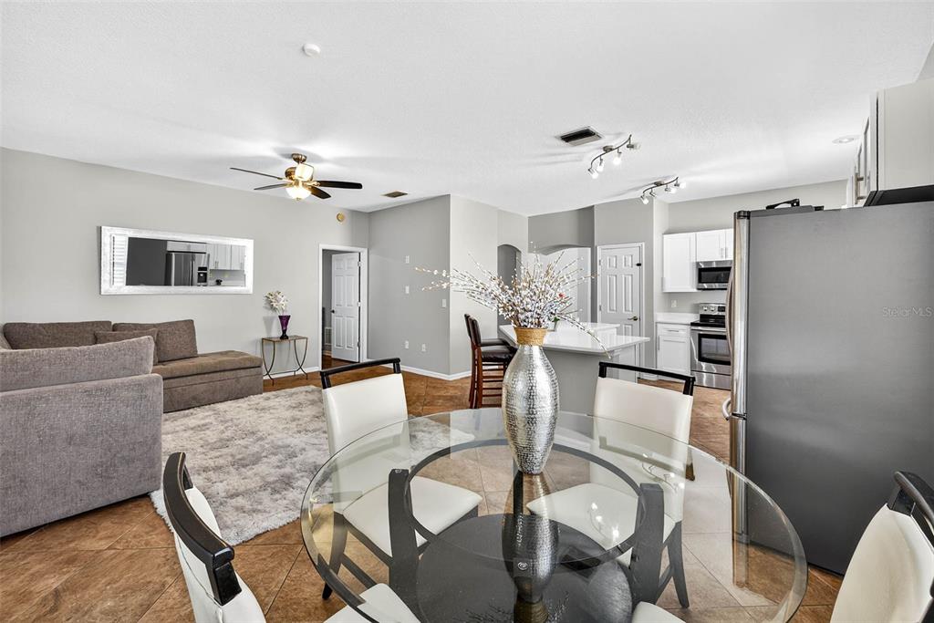 8853 Cypress Hammock Drive Tampa, FL 33614 - Photo 15 of 41 a living room with furniture and kitchen view