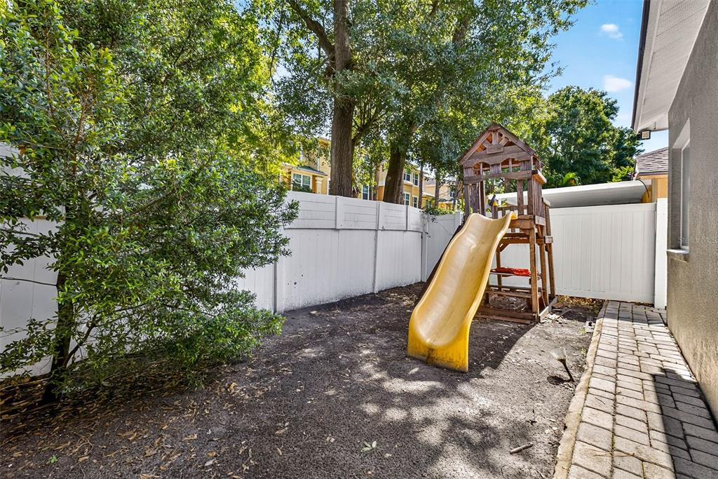 8853 Cypress Hammock Drive Tampa, FL 33614 - Photo 35 of 41 a view of a park with slide