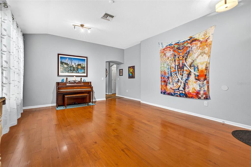 8853 Cypress Hammock Drive Tampa, FL 33614 - Photo 5 of 41 a view of room with furniture and ceiling fan
