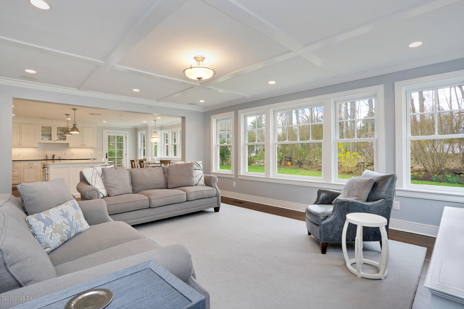 58 Indian Head Road Riverside, CT 06878 - Photo 15 of 33 a living room with furniture and a large window
