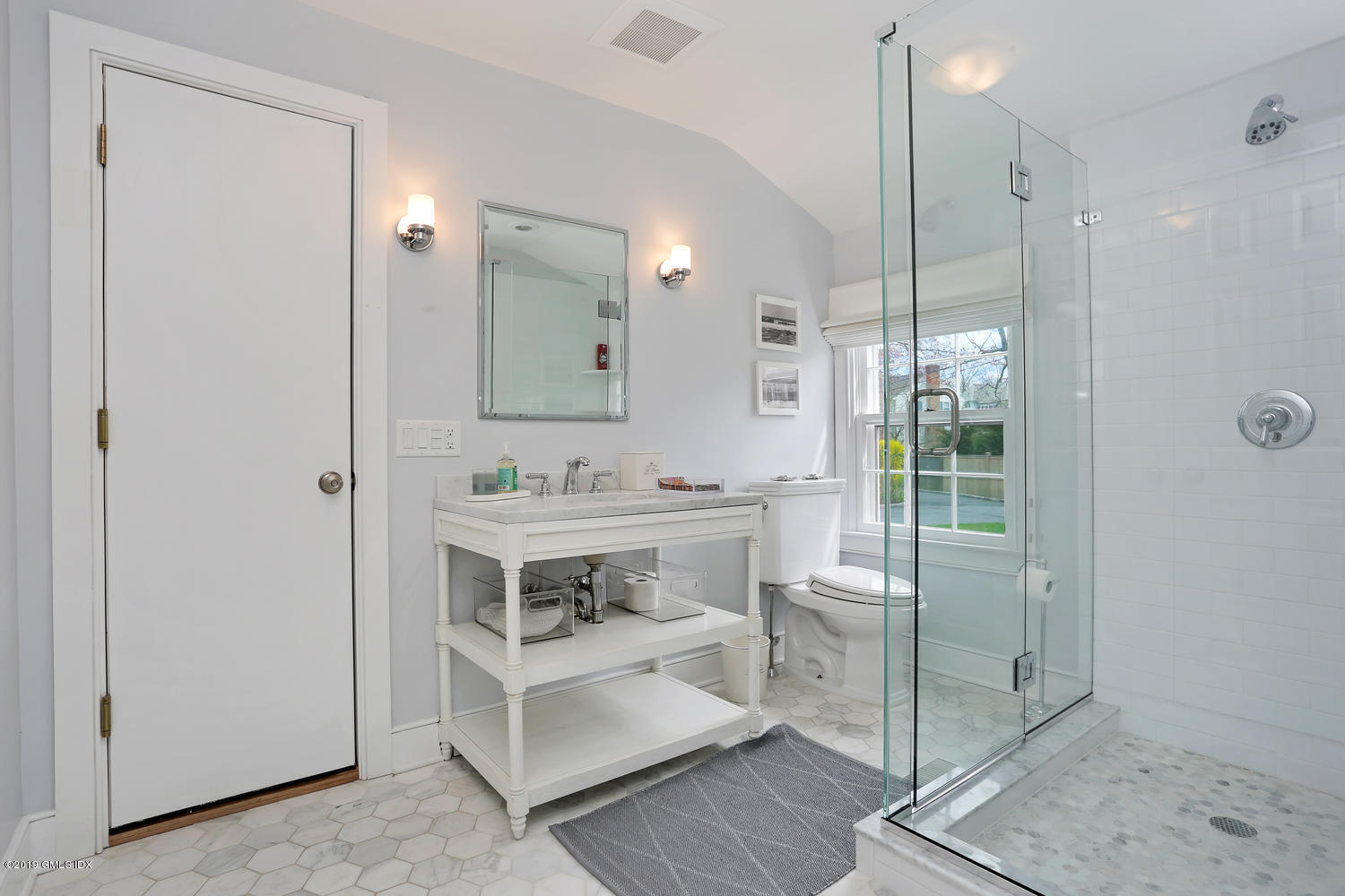 58 Indian Head Road Riverside, CT 06878 - Photo 17 of 33 a bathroom with a sink a toilet and shower