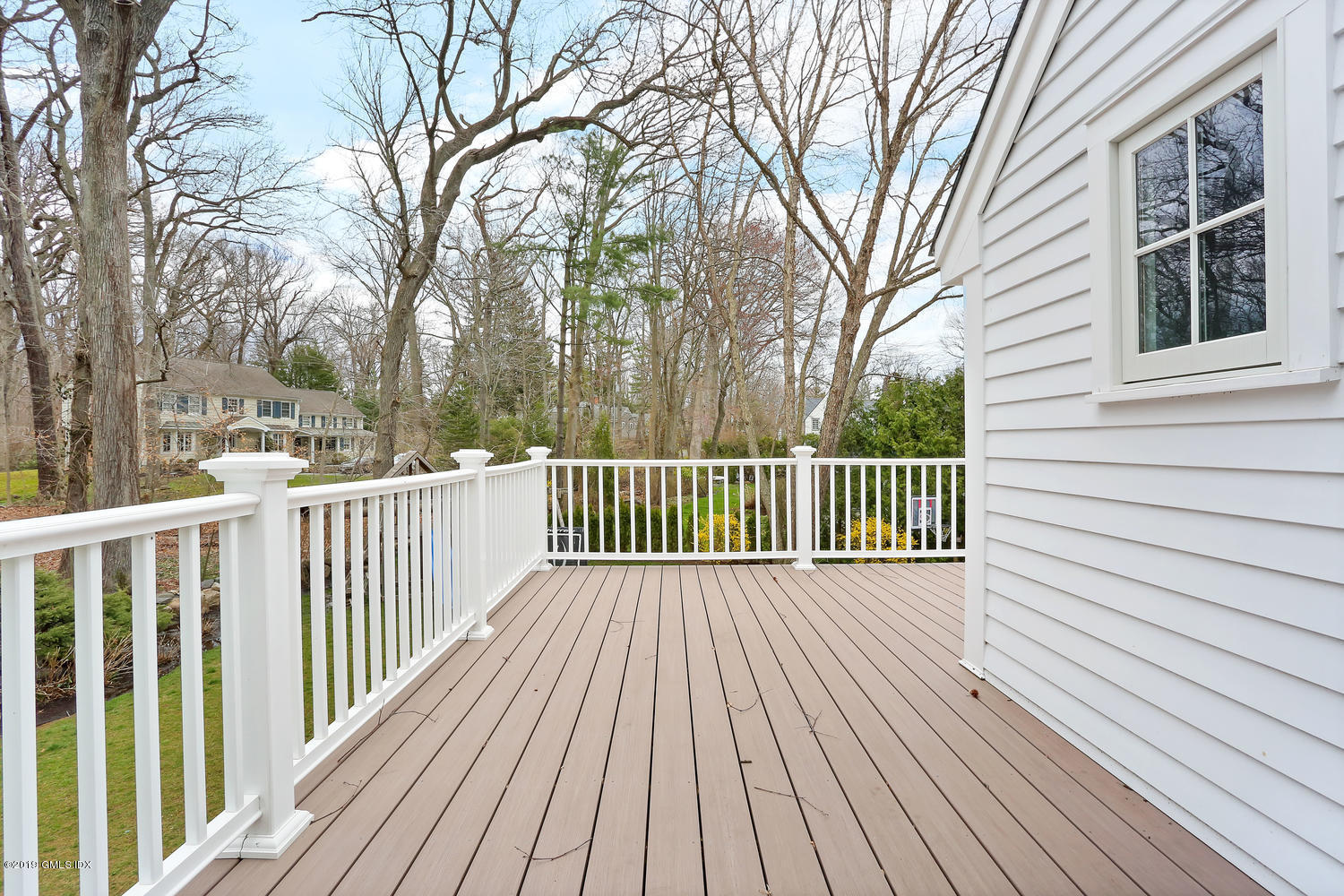 58 Indian Head Road Riverside, CT 06878 - Photo 20 of 33 a view of a wooden roof with wooden floor and fence