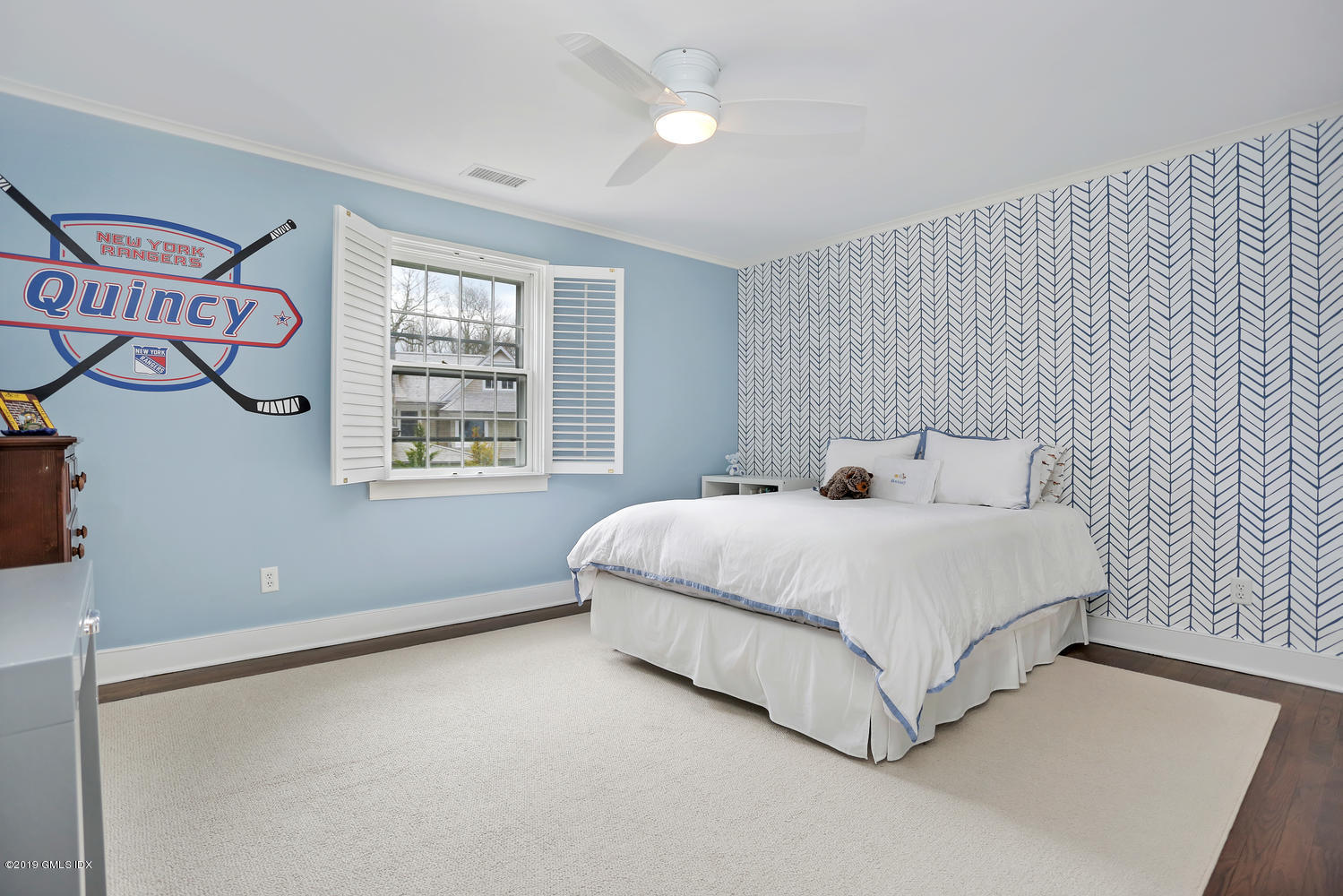 58 Indian Head Road Riverside, CT 06878 - Photo 22 of 33 a bedroom with a bed and a window