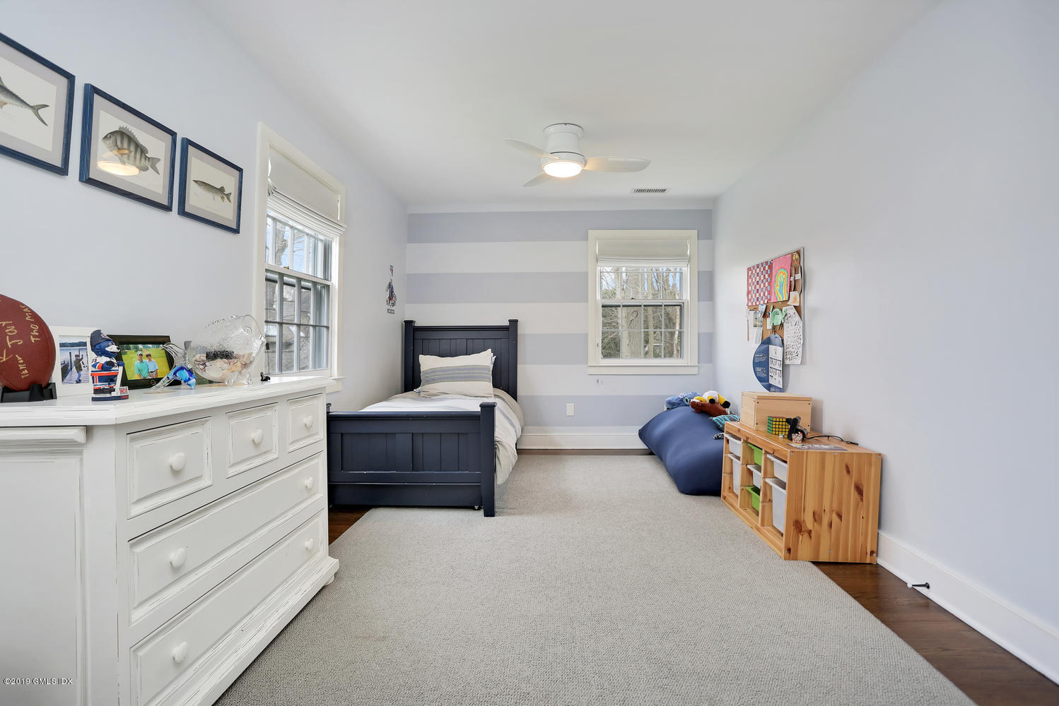 58 Indian Head Road Riverside, CT 06878 - Photo 24 of 33 a bedroom with furniture and a window