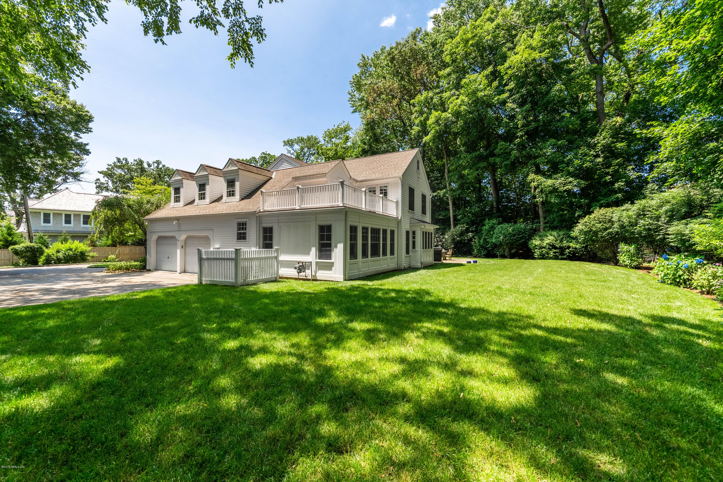 58 Indian Head Road Riverside, CT 06878 - Photo 28 of 33 a view of house with garden