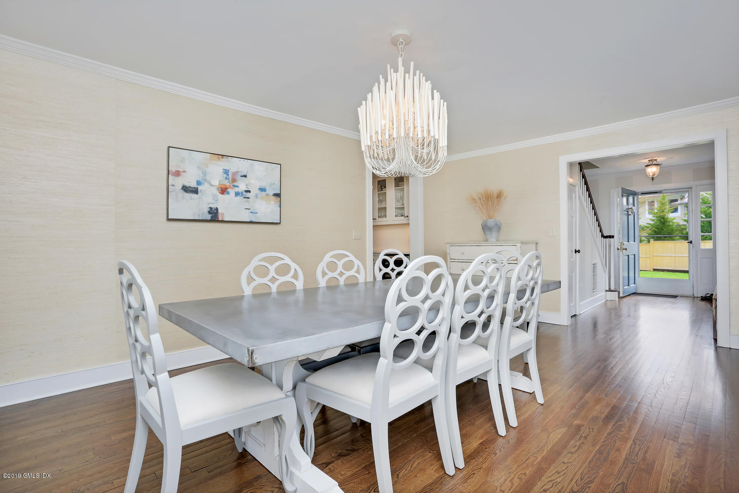 58 Indian Head Road Riverside, CT 06878 - Photo 8 of 33 a view of a dining room with furniture and chandelier