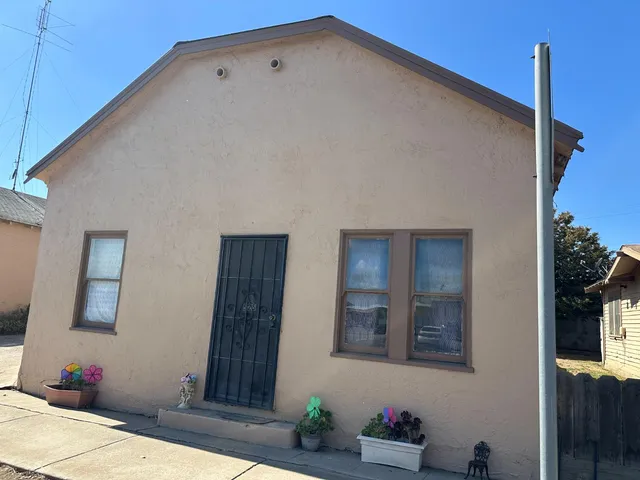 a view of hall way with furniture