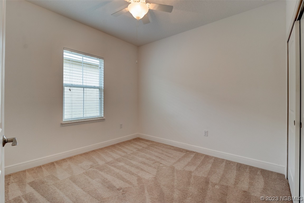 5421 Estero Loop Port Orange, FL 32128 - Photo 15 of 30 an empty room with a window