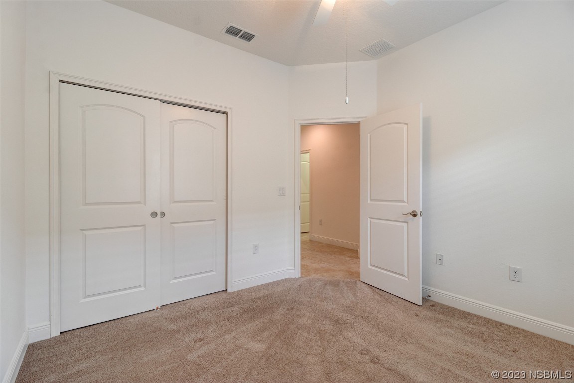 5421 Estero Loop Port Orange, FL 32128 - Photo 16 of 30 an empty room with closet area