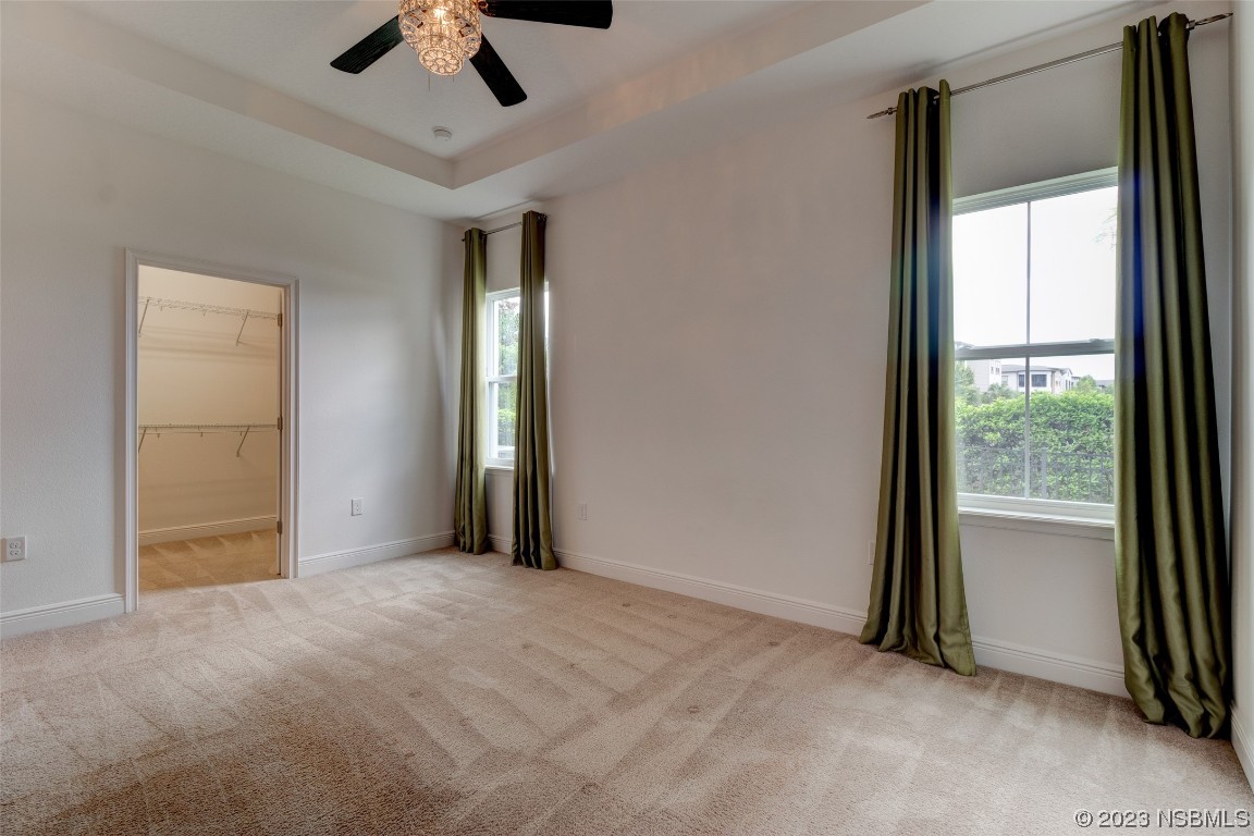 5421 Estero Loop Port Orange, FL 32128 - Photo 18 of 30 an empty room with windows and closet