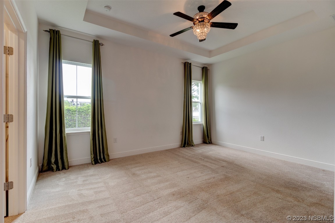 5421 Estero Loop Port Orange, FL 32128 - Photo 19 of 30 a view of a livingroom with a ceiling fan and window