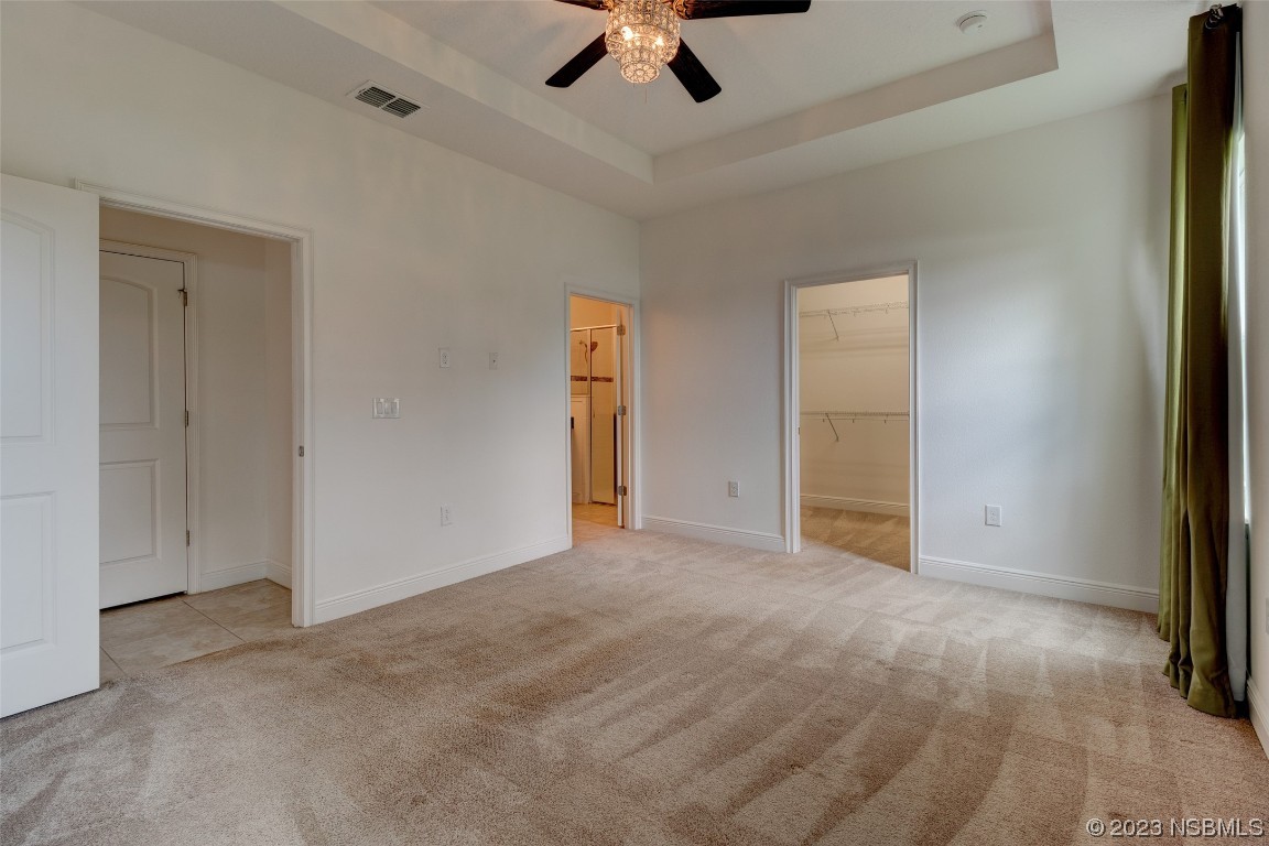 5421 Estero Loop Port Orange, FL 32128 - Photo 20 of 30 an empty room with view of ceiling fan