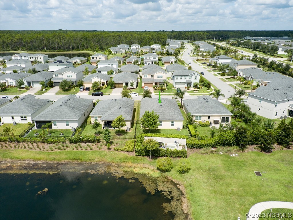 5421 Estero Loop Port Orange, FL 32128 - Photo 25 of 30 an aerial view of residential houses with outdoor space