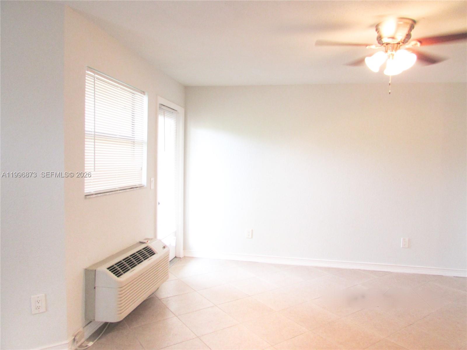 4581 West McNab Road, Unit 17 Pompano Beach, FL 33069 - Photo 10 of 12 a view of an empty room