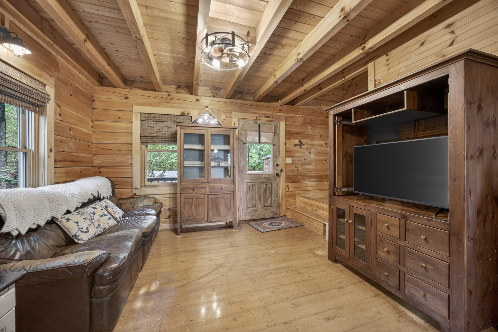 55214 Maynard Ridge Lane Crawford, TN 38554 - Photo 7 of 32 a living room with furniture and a flat screen tv