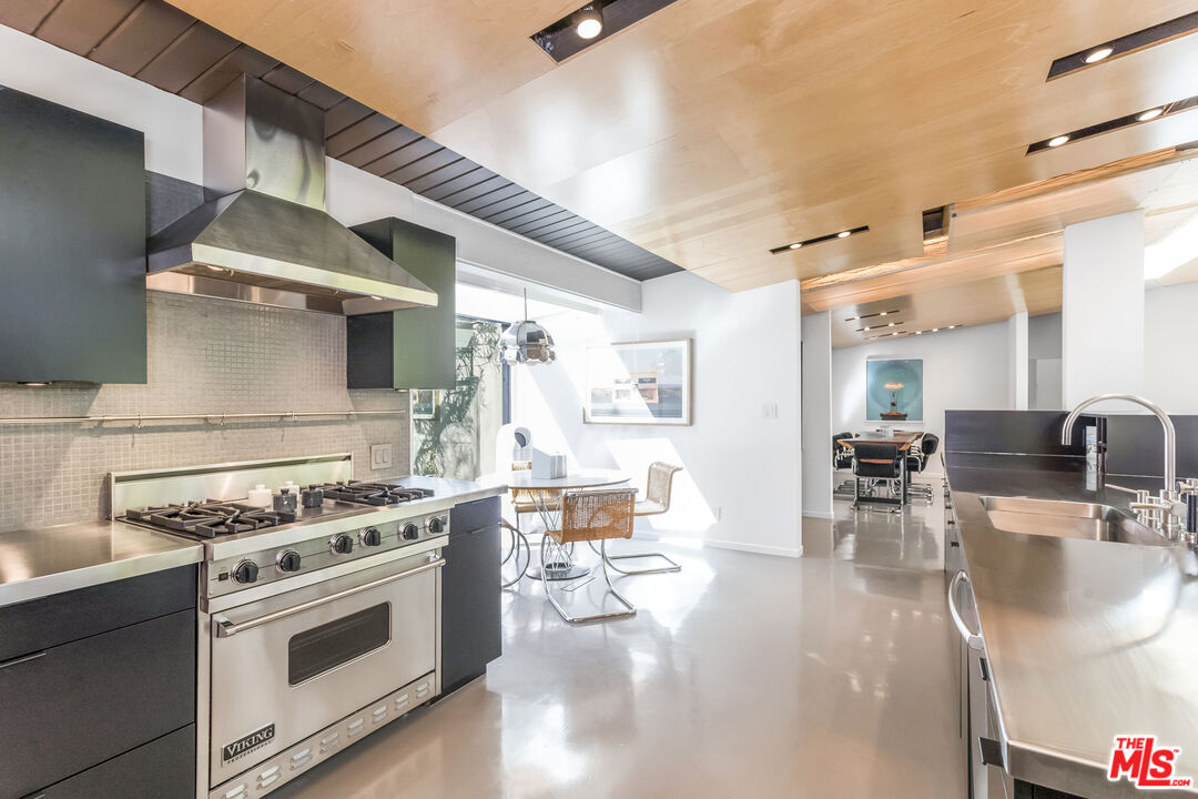 2538 Hutton Drive Beverly Hills, CA 90210 - Photo 20 of 63 a kitchen with stove and cabinets
