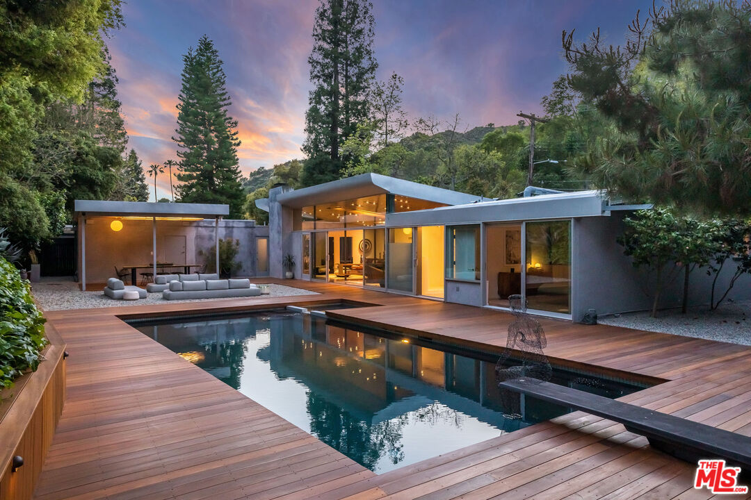 2538 Hutton Drive Beverly Hills, CA 90210 - Photo 2 of 63 a view of a house with pool and sitting area