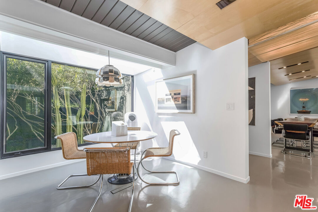2538 Hutton Drive Beverly Hills, CA 90210 - Photo 22 of 63 a living room with furniture and a large window