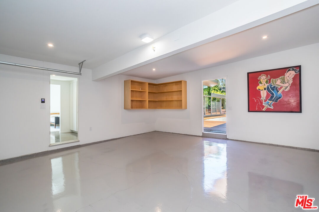 2538 Hutton Drive Beverly Hills, CA 90210 - Photo 47 of 63 a view of an empty room with a window