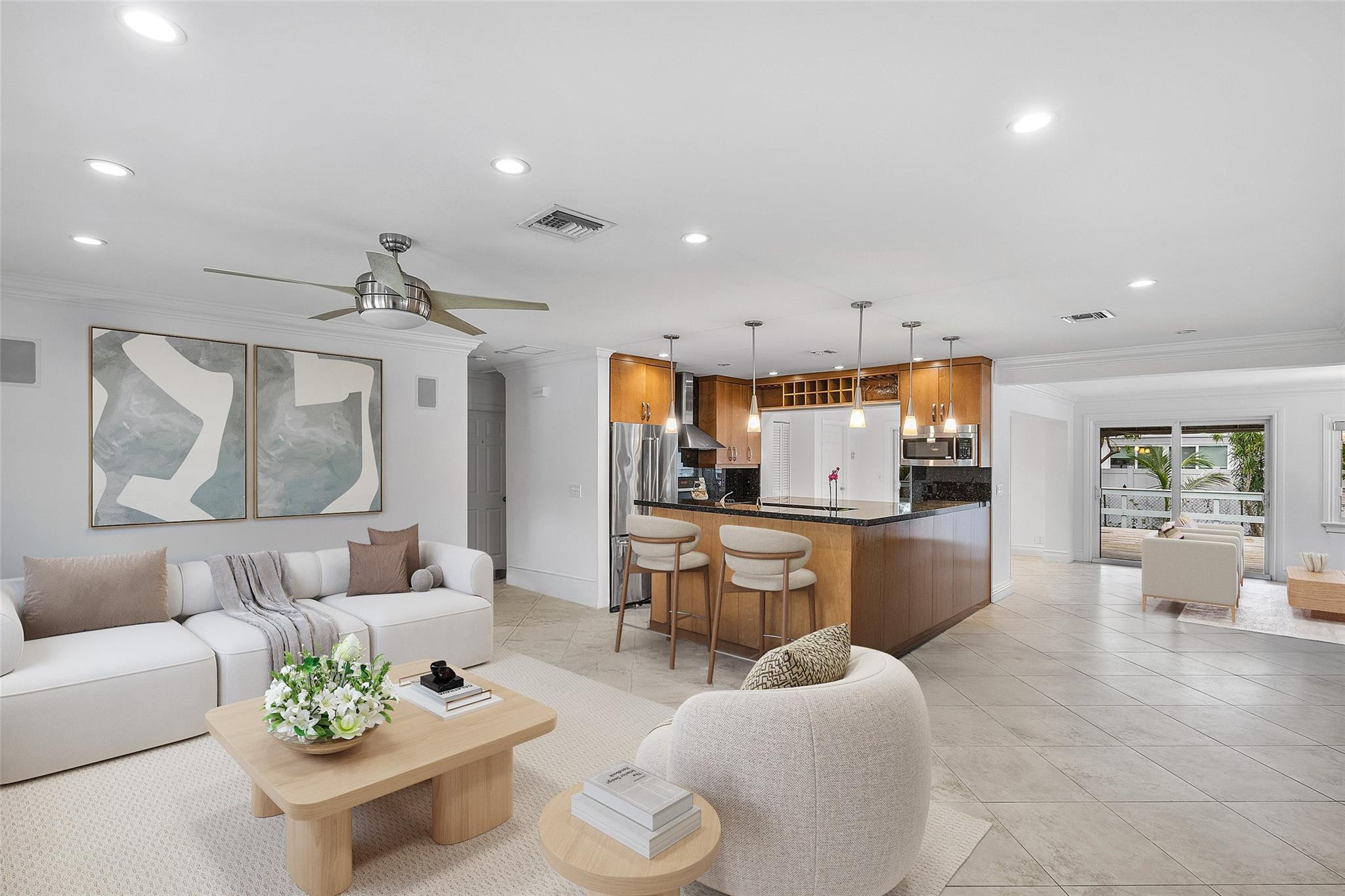 290 Northeast 29th Street Boca Raton, FL 33431 - Photo 1 of 48 a living room with furniture and a large window
