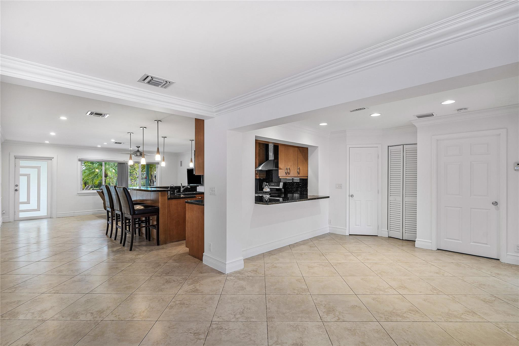 290 Northeast 29th Street Boca Raton, FL 33431 - Photo 18 of 48 a view of kitchen with furniture and a refrigerator