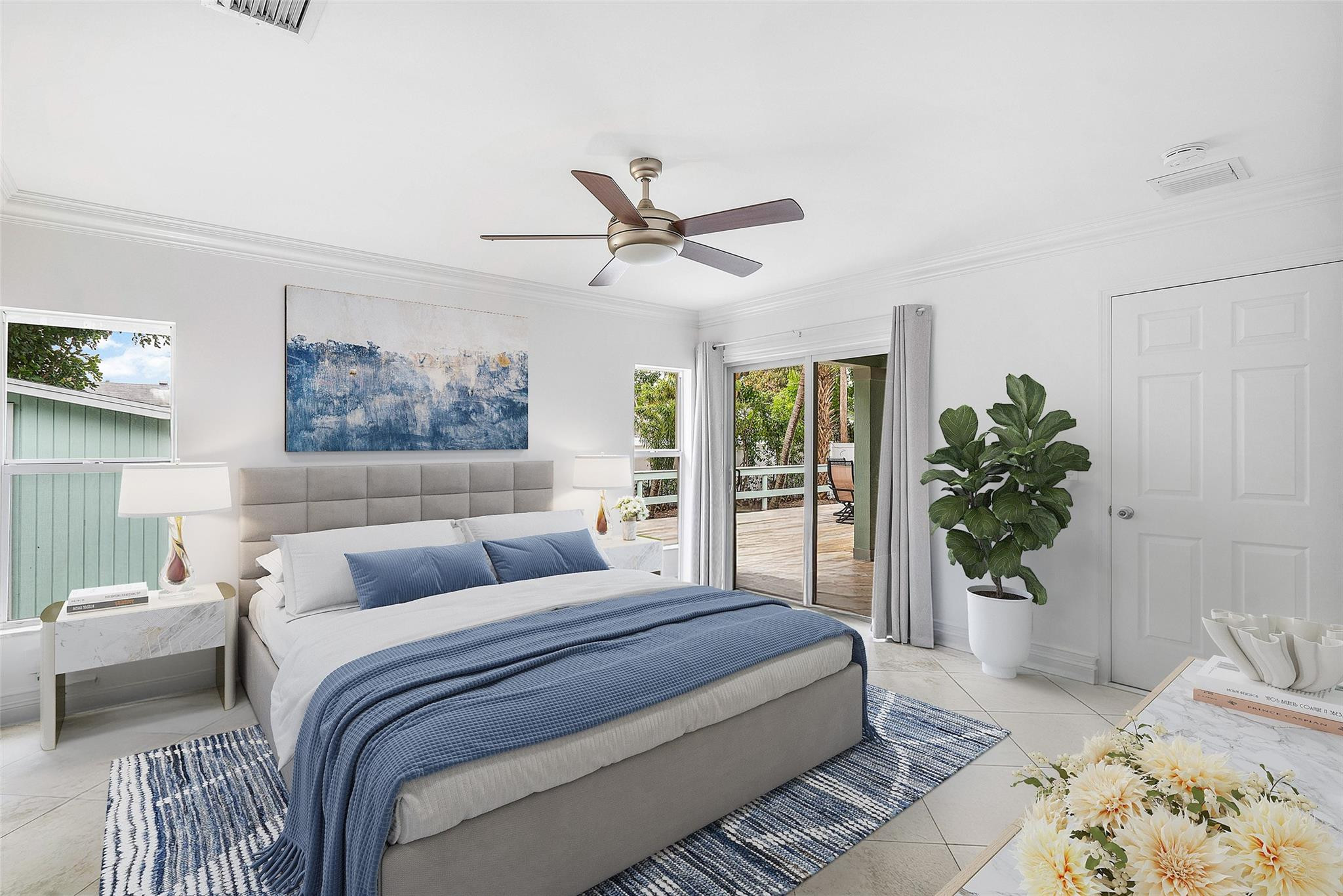 290 Northeast 29th Street Boca Raton, FL 33431 - Photo 19 of 48 a bedroom with a large bed and a couch