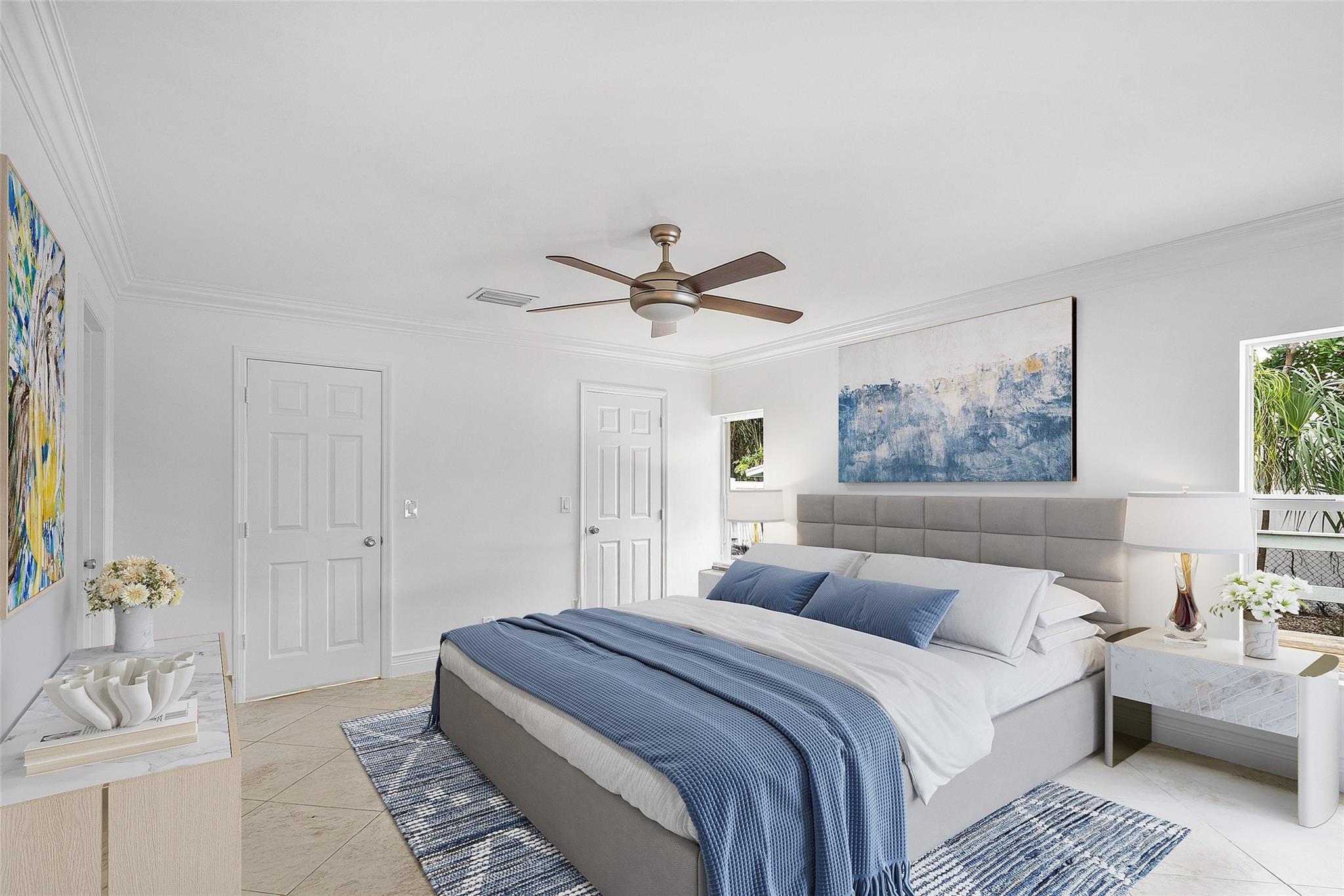 290 Northeast 29th Street Boca Raton, FL 33431 - Photo 20 of 48 a bedroom with a large bed and a chandelier