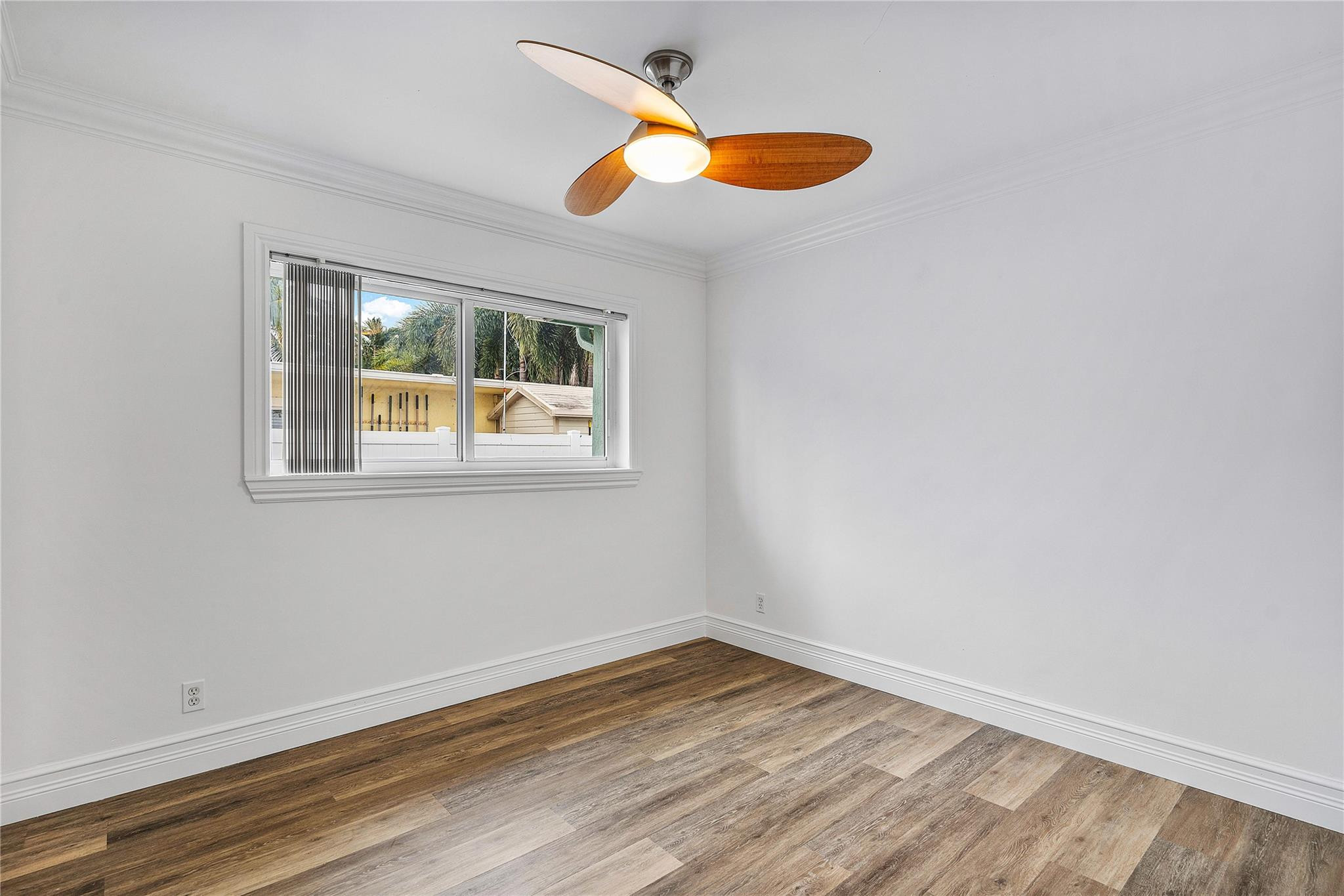 290 Northeast 29th Street Boca Raton, FL 33431 - Photo 27 of 48 an empty room and wooden floor
